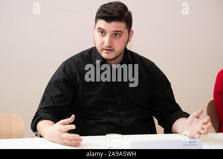 Stuttgart, Germany. 14th Nov, 2019. Ferdinand Dedaj, a geriatric care specialist with a Kosovan background, takes part in a press conference of Diakonie. Since 2015, more than 260 young Kosovars have begun training in nursing care for the elderly at Baden-Württembergische Diakonie, the welfare association of the Protestant Church. Credit: Tom Weller/dpa/Alamy Live News Stock Photo