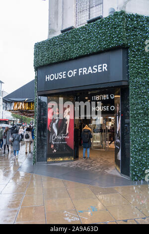Christmas decorations outside the House of Fraser entrance on Oxford Street, London, UK Stock Photo