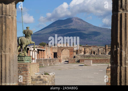 Pompei. Italy. Archaeological site of Pompeii. View of the Civil Forum (Foro Civile), in the foreground is the bronze sculpture of a centaur (Centauro Stock Photo