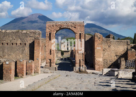 Pompei. Italy. Archaeological site of Pompeii. The so called Arch of Caligula, was the main entrance to Via di Mercurio.  View towards Via di Mercurio Stock Photo