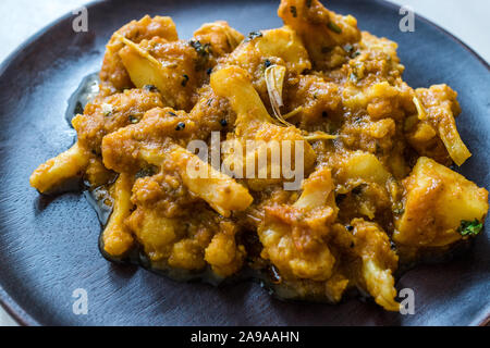 Indian Food Spicy Masaledar Aloo Gobi and Beans Tawa Sabzi Recipe. Traditional Food. Stock Photo