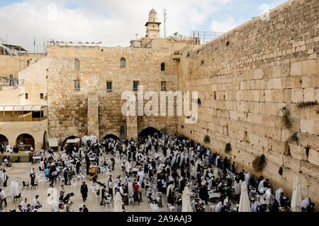 Jewish men praying at the Western Wall in Jerusalem, Israel Stock Photo