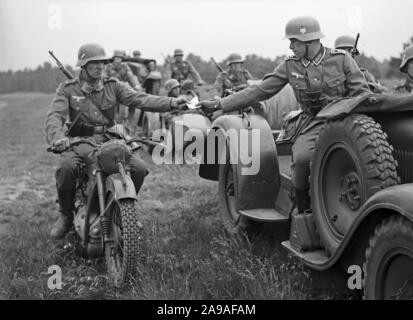 Soldiers of the German Wehrmacht practising and exercising on a ...