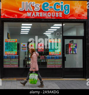 People passing JK's e-cig Vape Shop in Chapel Street, Central Business  District of Southport, Merseyside, UK Stock Photo