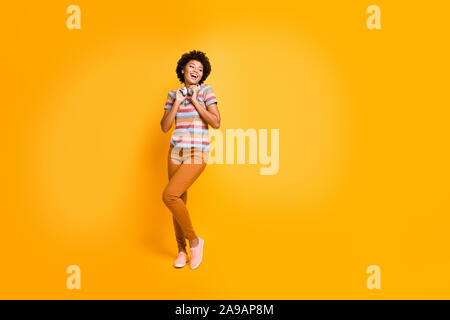 Wireless full-size headphones wearing a red heart-shaped box. Love music  concept. Front view Stock Photo - Alamy
