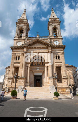 Basilica of Saints Cosmas and Damian on Piazza Antonio Curri in Alberobello in Apulia (Puglia), Southern Italy Stock Photo