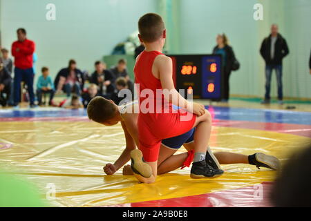 04.11.2017 Russia Novomoskovsak Sport Dvorets Children's wrestling competitions, illustration of disappointment from defeat Stock Photo