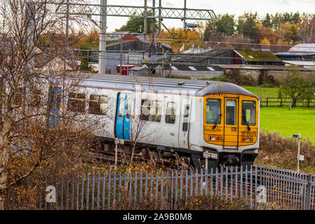 British Rail Class 319 is a dual-voltage electric multiple unit train at Winwick junction. Stock Photo