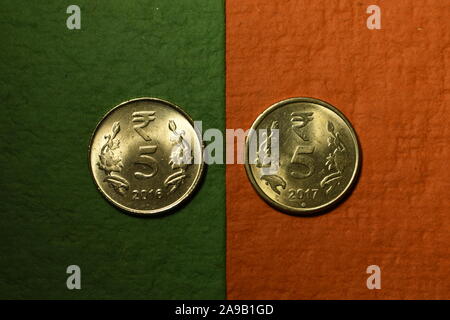 Two five rupee coins.