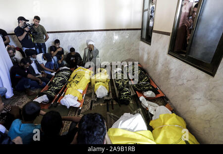 November 14, 2019, Gaza City, The Gaza Strip, Palestine: Palestinian mourners carry out the bodies of Rasmi Abu Malhous and seven members of his family who were killed in overnight Israeli missile strikes that targeted their house, during their funeral at a mosque in Deir al-Balah, central Gaza Strip, Thursday, Nov. 14, 2019. (Credit Image: © Mahmoud Issa/Quds Net News via ZUMA Wire) Stock Photo