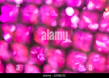 Fabric warm purple pink textile material texture pattern blur background. Stock Photo