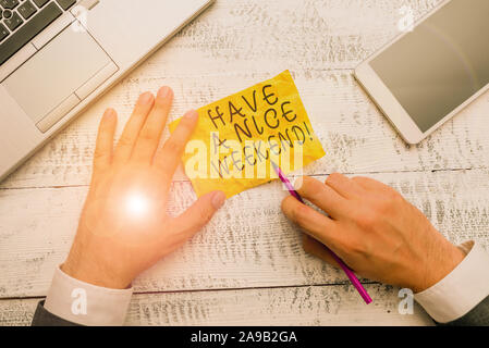 Conceptual hand writing showing Enjoy Your Weekend. Business photo text  wishing someone that something nice will happen at holiday White Sheet of Parchment  Paper with Ribbon Seal Stamp Label. Stock Photo by ©