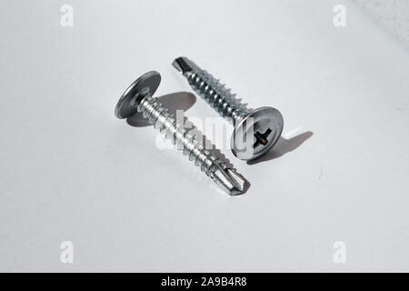Self tapping screw threaded rod hardened cement steel Stock Photo