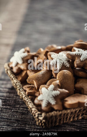 Gingerbread christmas cookies on kitchen table - Close-up. Stock Photo