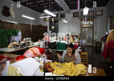 November 14, 2019, Bangkok, Bangkok, Thailand: Staff at the Praharuthai Convent in Bangkok, Thailand, prepare robes for bishops, deacons and priests ahead of Pope Francisâ€™ scheduled visit from November 20-23. The women have reportedly been working around the clock for the past two months making hundreds of robes by hand. Crowds are expected to exceed 30,000 people at the Mass at Bangkokâ€™s National Stadium. (Credit Image: © Andre Malerba/ZUMA Wire) Stock Photo