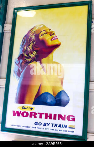 Corfe castle railway station. Poster for Holidays in Worthing. 1950s 1960s Stock Photo