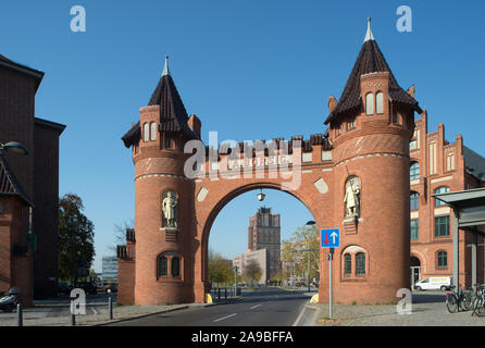 15.10.2018, Berlin, , Germany - The Borsigtor - entrance portal to the former site of the Borsigwerke in Berlin-Tegel. In the background the Borsigtur Stock Photo