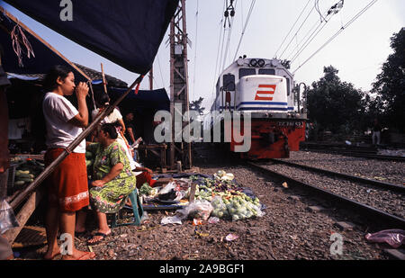17.05.2016, Jakarta, , Indonesia - Women at a small street market next to the railway tracks in a slum of the Indonesian capital. 0SL090810D004CARO.JP Stock Photo