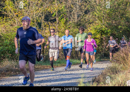 Runner competing in 'King of the James' triathlon. Stock Photo