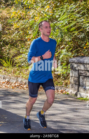 Runner competing in 'King of the James' triathlon. Stock Photo