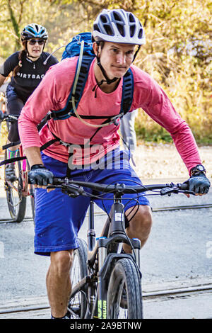 Cyclist competing in the 'King of the James' triathlon. Stock Photo