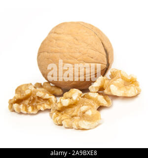 Walnuts against white background close up Stock Photo