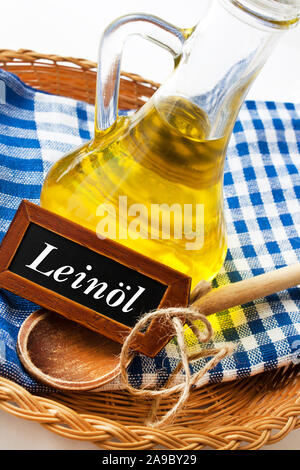 German Linseed Oil with label and spoon Stock Photo