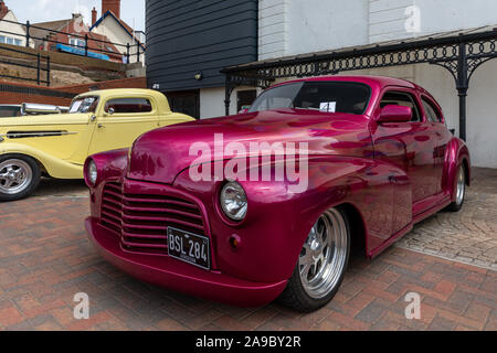 An American 1942 Chevrolet GMC custom car at 'Race the Waves' event, where cars and motorcycles drag race on the beach at Bridlington, East Yorkshire Stock Photo