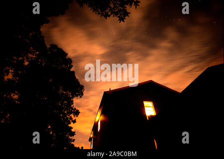 Summer Orange sky at Midnight Stock Photo