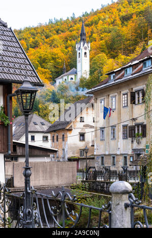The village of Kropa, Slovenia with fall foliage color Stock Photo - Alamy