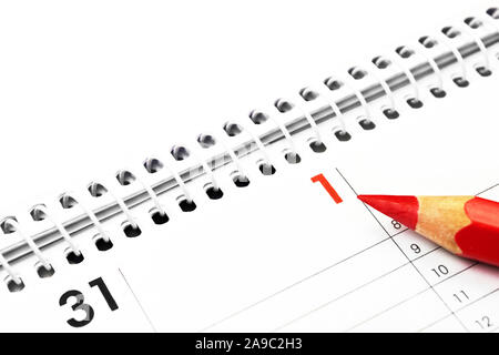 Calendar and red pencil close up Stock Photo