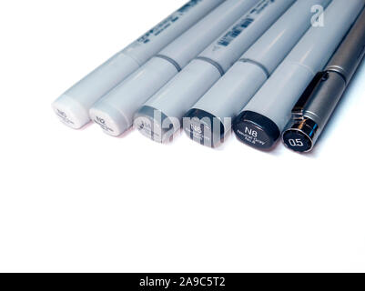 Seattle, WA / USA - October 25th, 2019: Close up of grayscale Copic refillable ink markers on a white background, flat lay Stock Photo