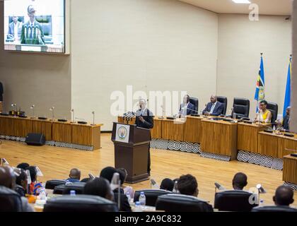 (191114) -- KIGALI, Nov. 14, 2019 (Xinhua) -- Rwandan President Paul Kagame (C) delivers remarks at a ceremony swearing in newly appointed cabinet ministers and senior military officers at the parliament in Kigali, Rwanda, on Nov. 14, 2019. Paul Kagame on Thursday warned that people who are trying to destabilize Rwanda, including those backed by foreign forces, will bear a heavy cost for their actions. (Office of the President of Rwanda/Handout via Xinhua) Stock Photo