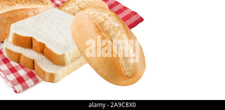 Wheat bread rolls and bread slices Stock Photo