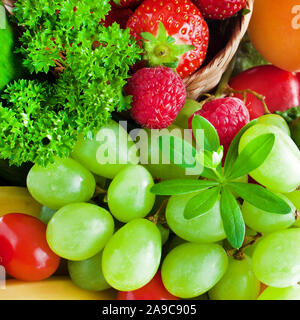 Various fruits and vegetables with woodruff Stock Photo