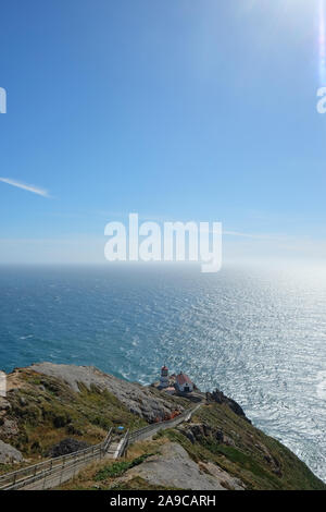 Looking down on Lighthouse on Point Reyes with Ocean and Sky Stock Photo