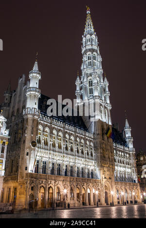 A view of the magnificent Brussels Town Hall illuminated at night, located in the historic Grand Place in the city of Brussels, Belgium. Stock Photo