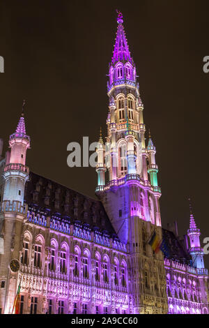 A view of the magnificent Brussels Town Hall illuminated at night, located in the historic Grand Place in the city of Brussels, Belgium. Stock Photo