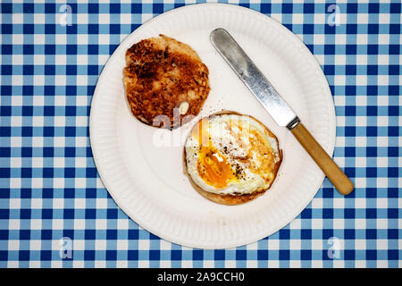 Toasted muffin with fried egg Stock Photo