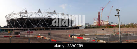 London, UK - June 2nd 2011: A view of the London Olympic Stadium and Park in Stratford under construction with approximately one year until the openin Stock Photo