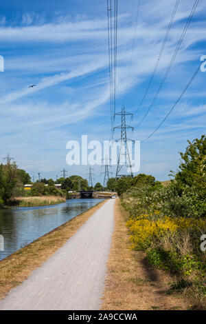 Walking along the River Lee Navigation towpath between Chingford and Enfield. Stock Photo