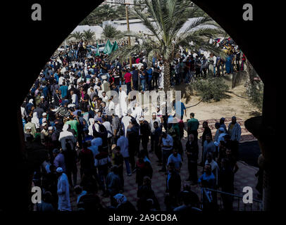 Crowd of Palestinian mourners during a funeral of Rasmi Abu Malhous and seven members of his family at a mosque in Deir al-Balah, central Gaza Strip. The deceased were killed in an overnight Israeli missile strike that targeted their house. Stock Photo