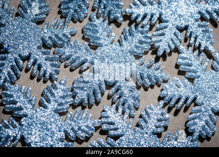 Winter background of collection of large sparkling silver snowflakes Stock Photo