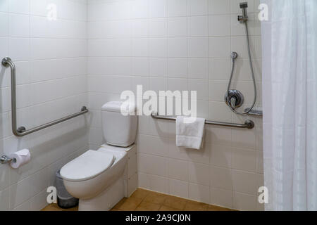 a clean and neatly furnished bathroom in an Australian hotel Stock Photo