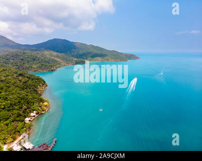 Aerial view of tropical island coast and beaches with blue transparent sea and green rainforest, paradise summer vacation holidays destination, beauti Stock Photo