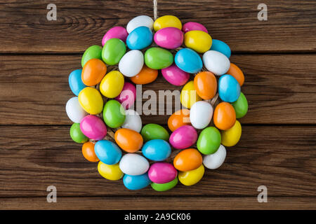 Easter egg decoration against wooden background Stock Photo