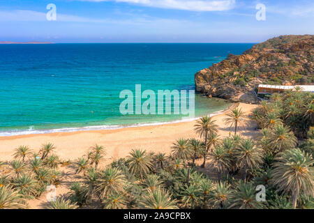 Scenic landscape of palm trees, turquoise water and tropical beach, Vai, Crete, Greece. Stock Photo