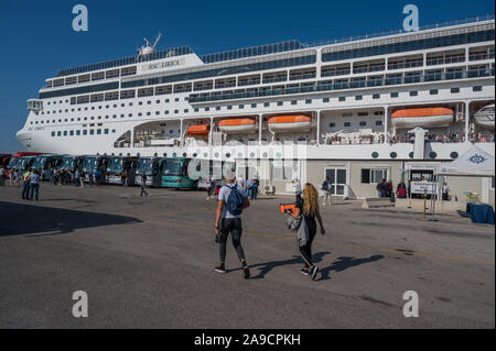 Busses dropping people off to board the cruise ship MSC Lyrica in Venice, Italy Stock Photo