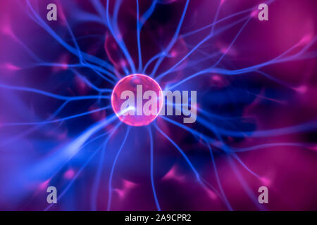 An image of a plasma lamp with moving light beams Stock Photo