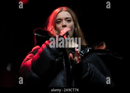 Manchester, UK. 14th Nov, 2019. Singer-songwriter Becky Hill performs at the city's Christmas Lights Switch On event on Deansgate. Credit: Russell Hart/Alamy Live News Stock Photo